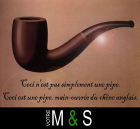 translation: This is not just a pipe - this is a hand-crafted pipe made from the finest english oak